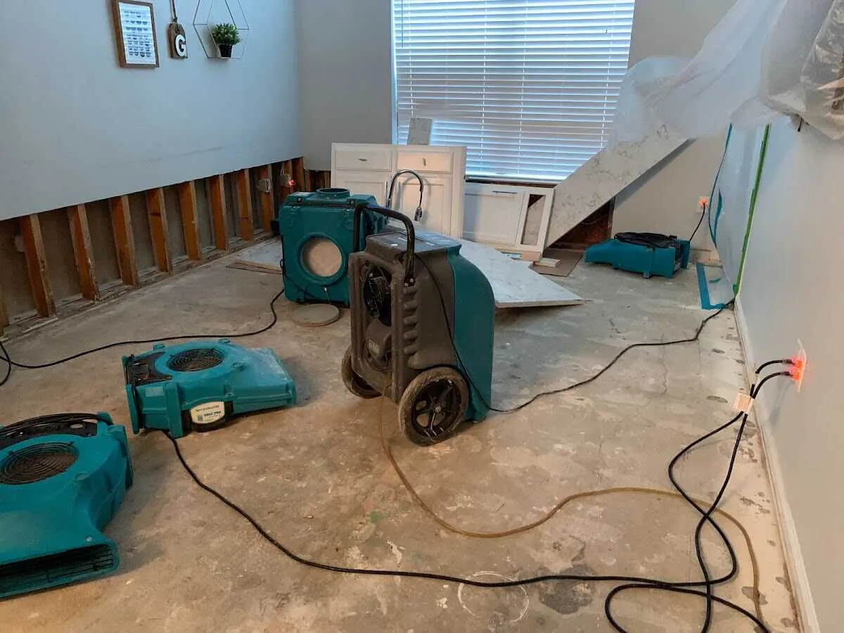 Dehumidifier in flood-cut room for Water Damage Restoration in Blair